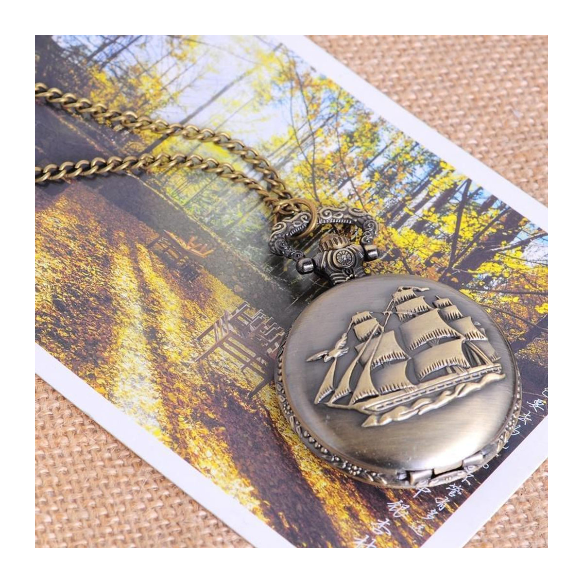 GT Vintage Quarz-Taschenuhr aus Metall in Gold und Braun mit Segelboot-Motiv, rund und hängend - Bild 3