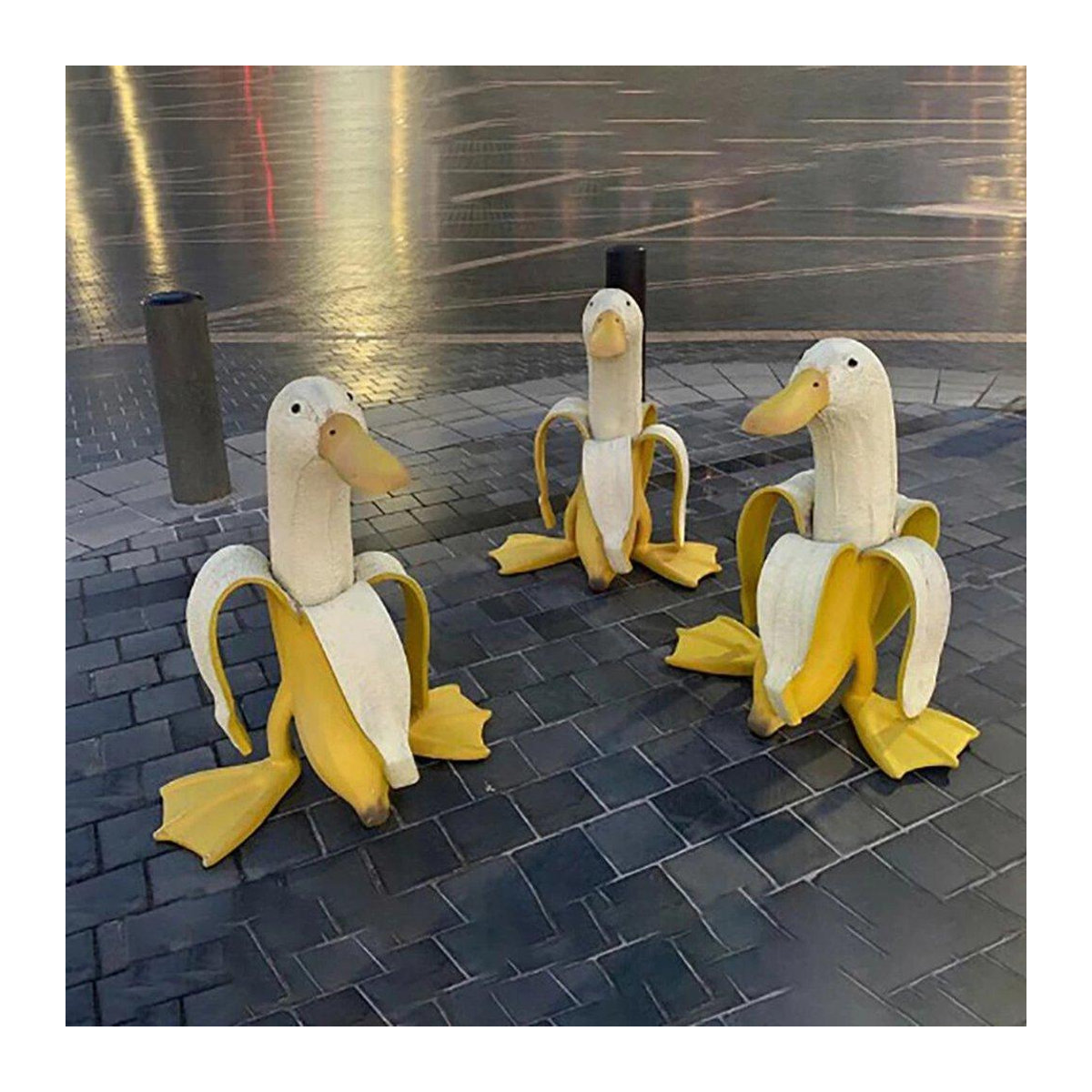 Kreative Bananen-Ente als skurrile Gartendekoration und Vintage-Skulptur aus Harz in Gelb - Bild 4