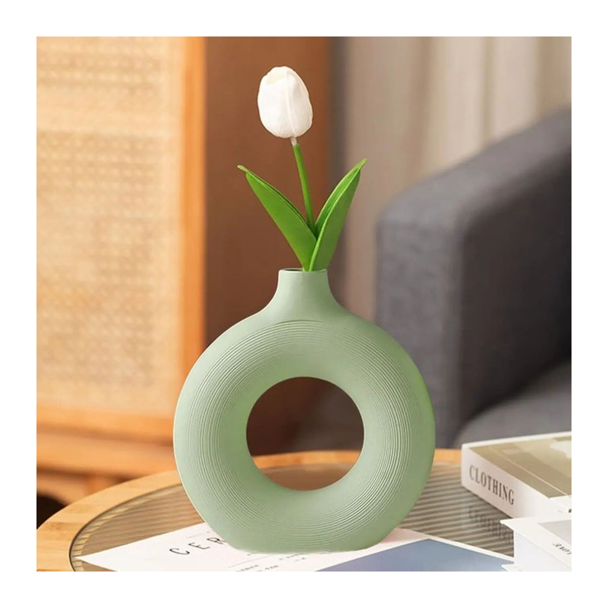 Runde Keramikvase in Hellgrün mit mattem Finish im minimalistischen nordischen Design - Bild 1