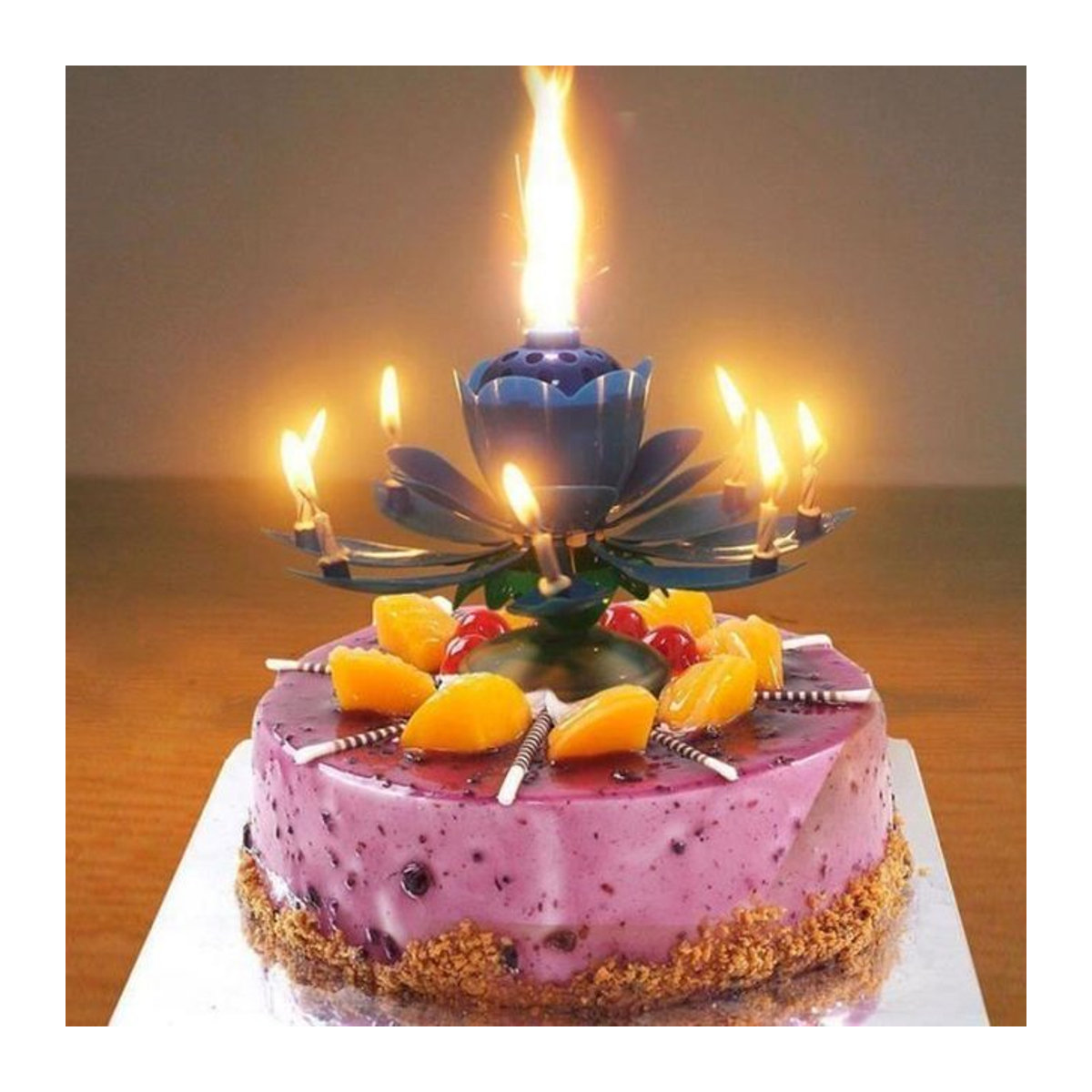 SHOP-STORY Magische Geburtstagskerze in Blau mit drehender musikalischer Blume als Kuchendekoration - Bild 1